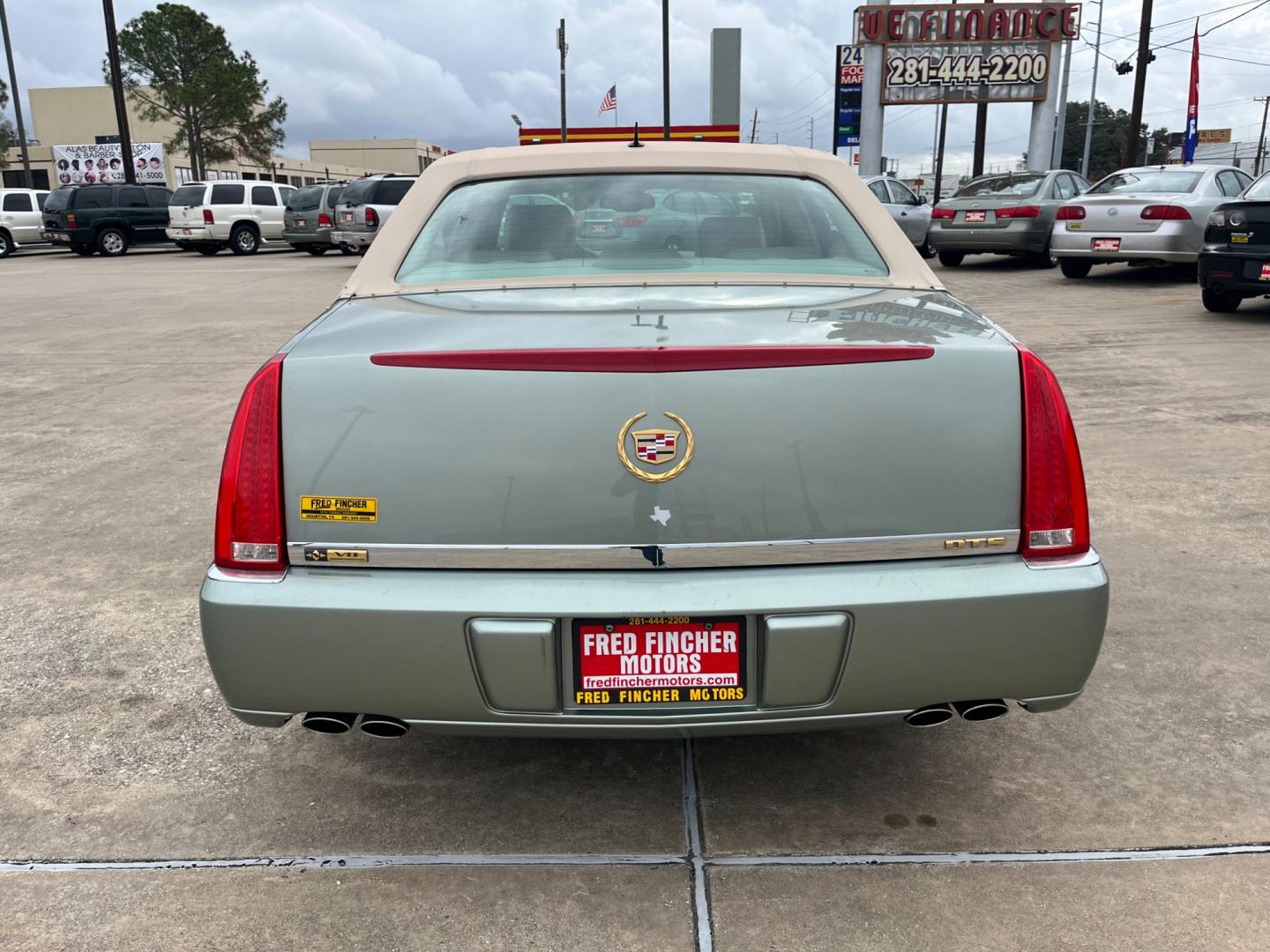 2006 green /TAN Cadillac DTS Sedan (1G6KD57Y96U) with an 4.6L V8 DOHC 32V engine, 4-Speed Automatic Overdrive transmission, located at 14700 Tomball Parkway 249, Houston, TX, 77086, (281) 444-2200, 29.928619, -95.504074 - Photo#5